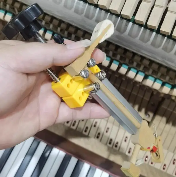 Hammer remover/piano tuning maintenance tool