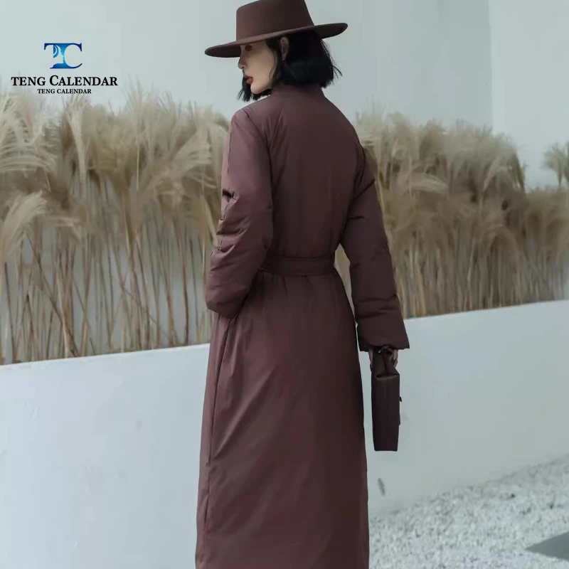 Winterdonsjack, hoogwaardige knielengte luie stijl taille cinched witte eendendonsjas, dames 2025, nieuwe stijl