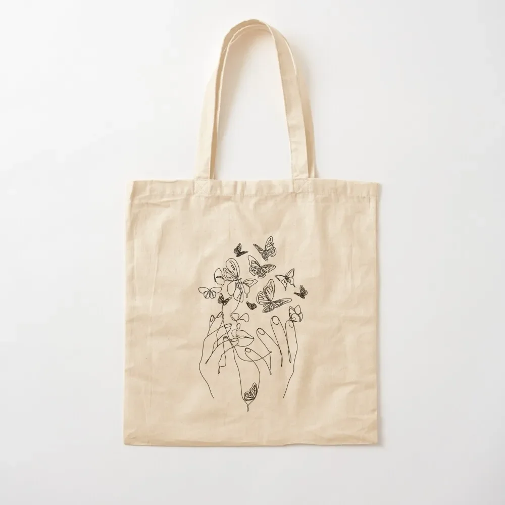 

Abstract face with butterfly by one line drawing. Portrait minimalistic style. Botanical print. Nature symbol of cosmet Tote Bag