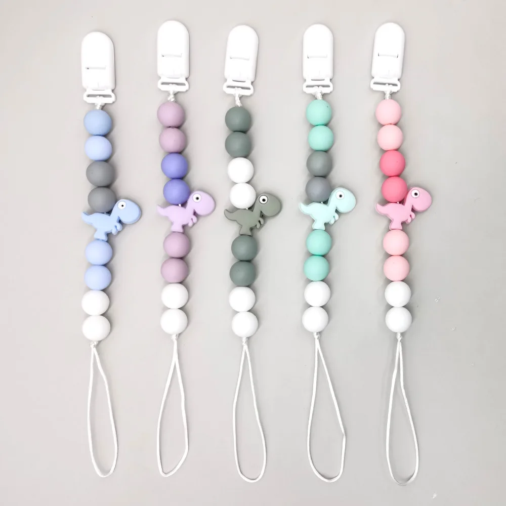 

Baby Pacifier Clips Holder Silicone Cartoon Dinosaur Teething Chain Wood Teether For Baby Pacifier Chain Nursing Chew Toys Gift