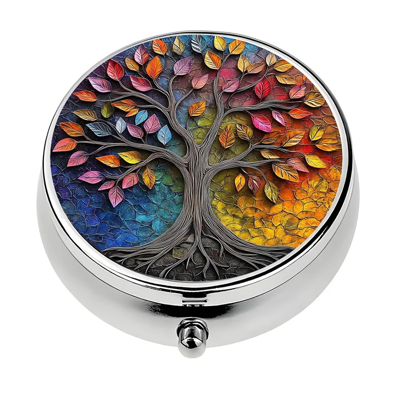 A compact pill organizer with a three-compartment design, featuring a brightly colored tree theme. This portable pill box is perfect for keeping in your pocket or wallet and makes an ideal and unique gift.