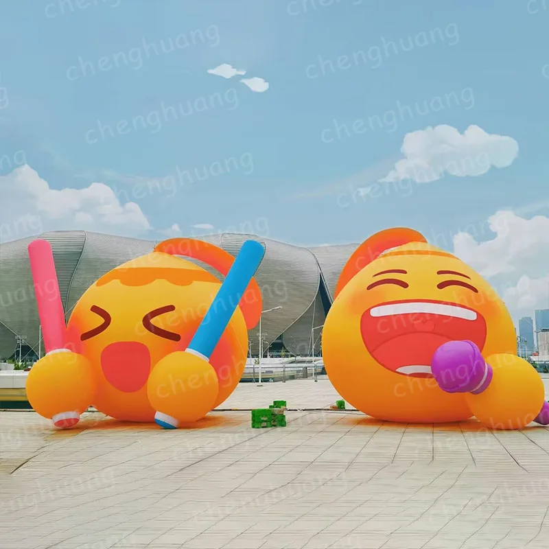 

Two inflatable emoticons with blowers, outdoor square activity decoration props