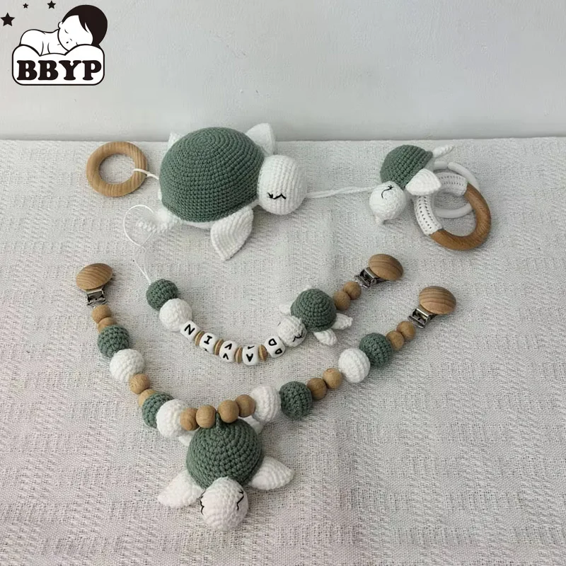 

Stroller chain Pacifier Chain With Name Gym Educational Ring Teething Toy Baby Cotton Turtle Wooden Ring Rattle Crochet Wool To