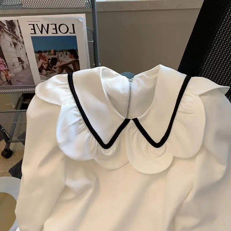 

Simple White Peter Pan Collar Shirt Women 2025 Spring Autumn New All-match Blouses Y2k Bow Flare Sleeve Blusas Mujer