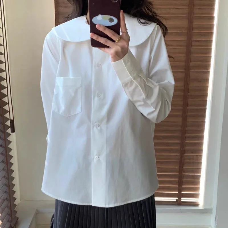 เสื้อเชิ้ตแขนยาวทรงเข้ารูป คอทรงกลม สีพื้น แต่งกระเป๋าเสื้อ แฟชั่นผู้หญิง ฤดูใบไม้ผลิ/ฤดูร้อน 2025