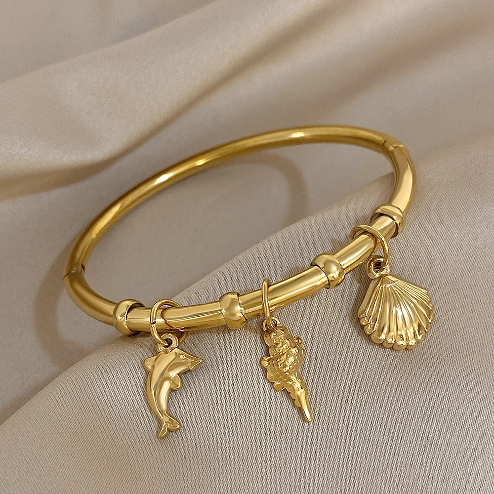 

Модные массивные браслеты из нержавеющей стали для женщин, милые позолоченные подвески в виде раковины дельфина, браслет, ювелирные изделия, подарки