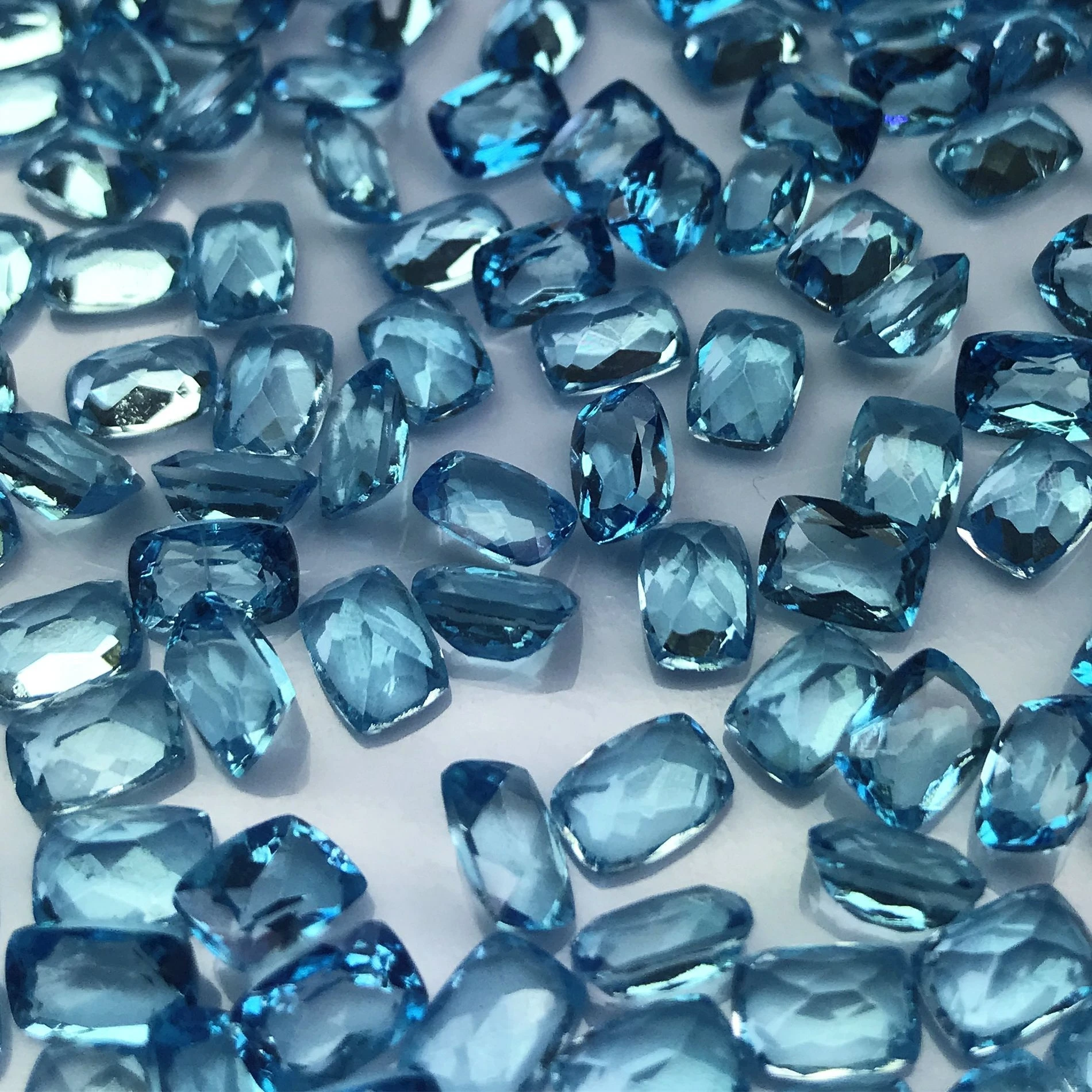 

Высокое качество 5*7 мм швейцарский синий топаз огранки подушки