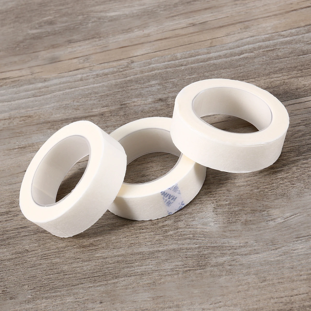 

6 Rolls Eyelash Extension Medical Tape Non-Woven Fabric Gentle Skin-Safe Lash Isolation Paper Replacement 125cmx9m