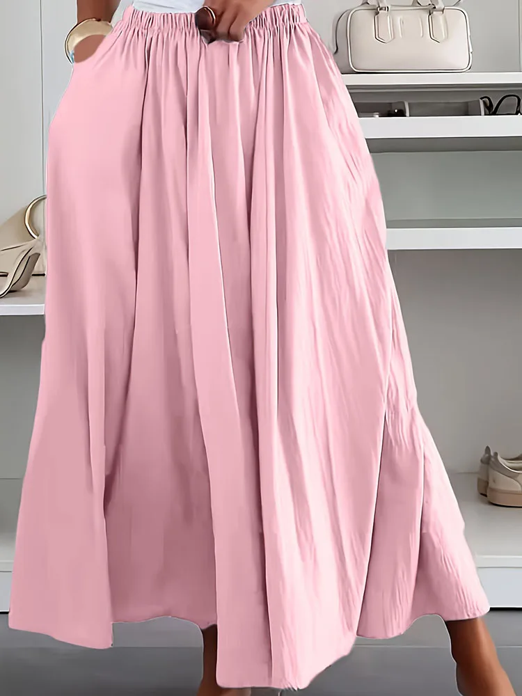 الصيف البوهيمي الشاطئ المرأة تنورة الشارع الشهير عادية بلون مكتب تنانير للسيدات 2025 الربيع عالية الخصر فضفاض ألف خط تنورة