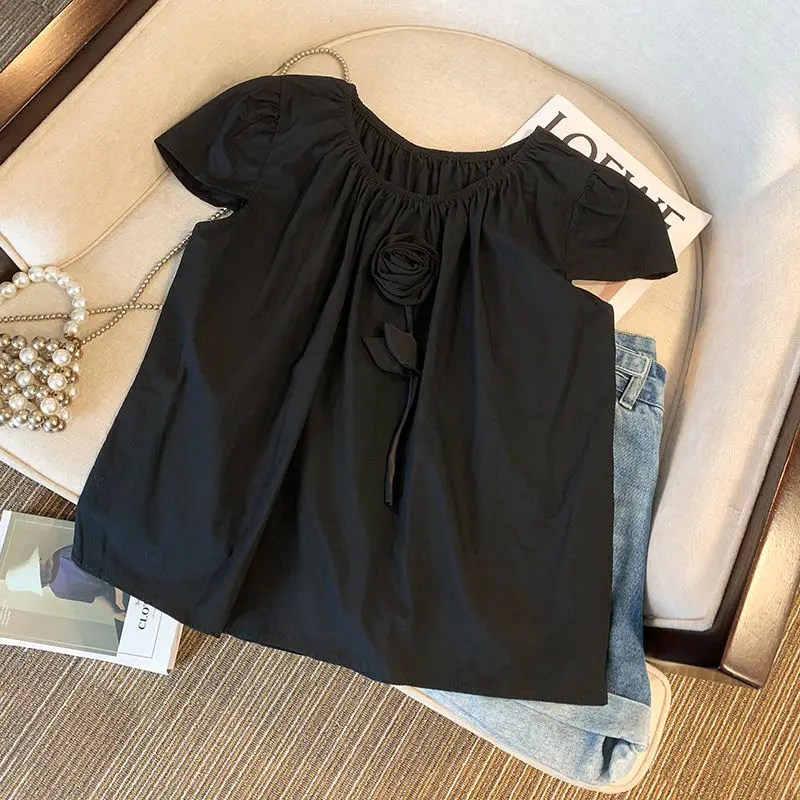 フレンチスイート年齢軽減デザインニッチ立体フラワーパフスリーブシャツ女性の新しい夏のトップ