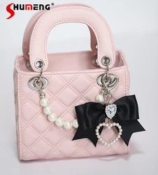 Japanisches Mädchen niedlich handgemachte rosa Umhängetasche 2023 Herbst neue Mine Massen produktion süße coole Bogen Liebe Strass Handtasche für Frauen