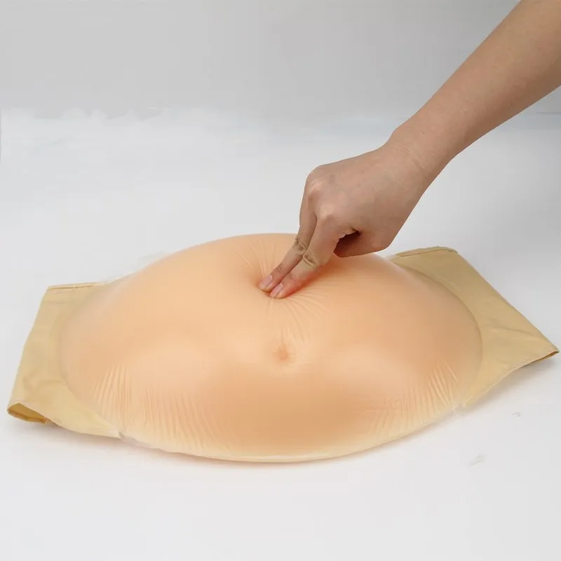 

Fake belly, fake pregnancy props, studio actors, fake pregnant women, simulated photography, silicone belly