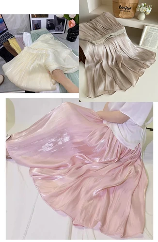 2025 Primavera/Novedad de verano brillo A-line falda de mujer Color sólido cintura alta estilo francés París elegante falda asimétrica