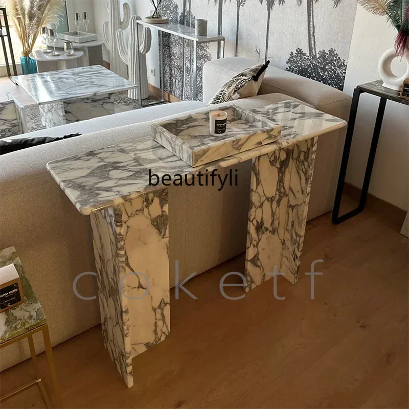 

xxqDesigner high sense natural white marble villa living room against the wall entrance table
