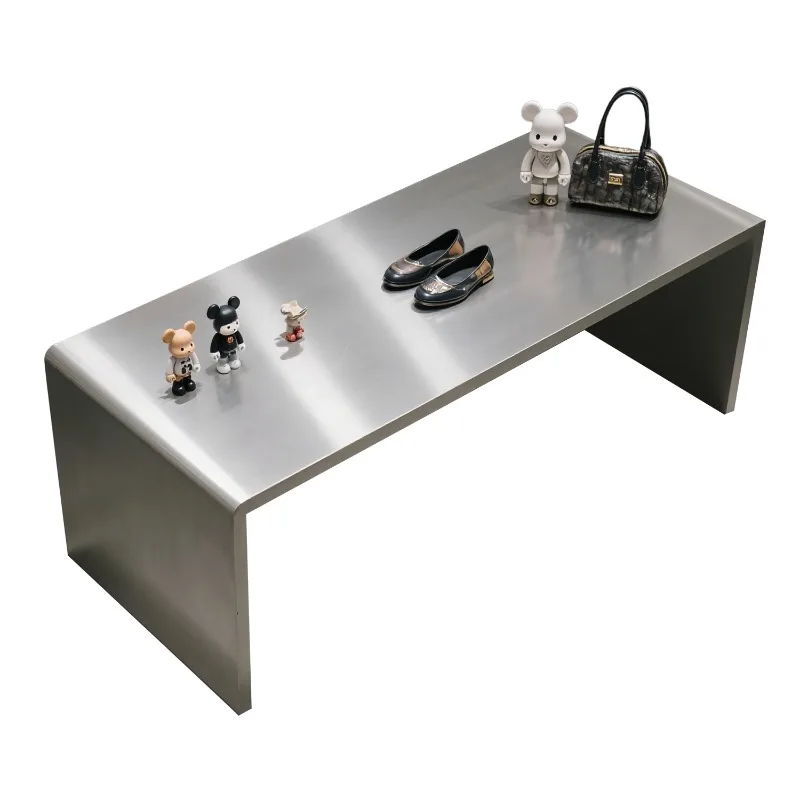 Simple modern clothing store island table light luxury high-end product sample island display table beauty salon flowing table
