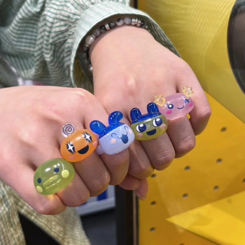 

Tamagotchi Mimitchi Memetchi and Kuchipatchi Transparent Design Ring Cartoon Electronic Pet Characters Ring Gaming Peripherals