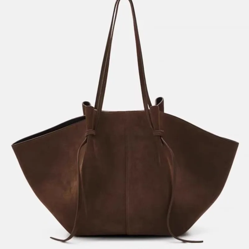 

Cross-border spot 2025 popular large-capacity wing bag tote underarm hollow suede matte portable shoulder bag