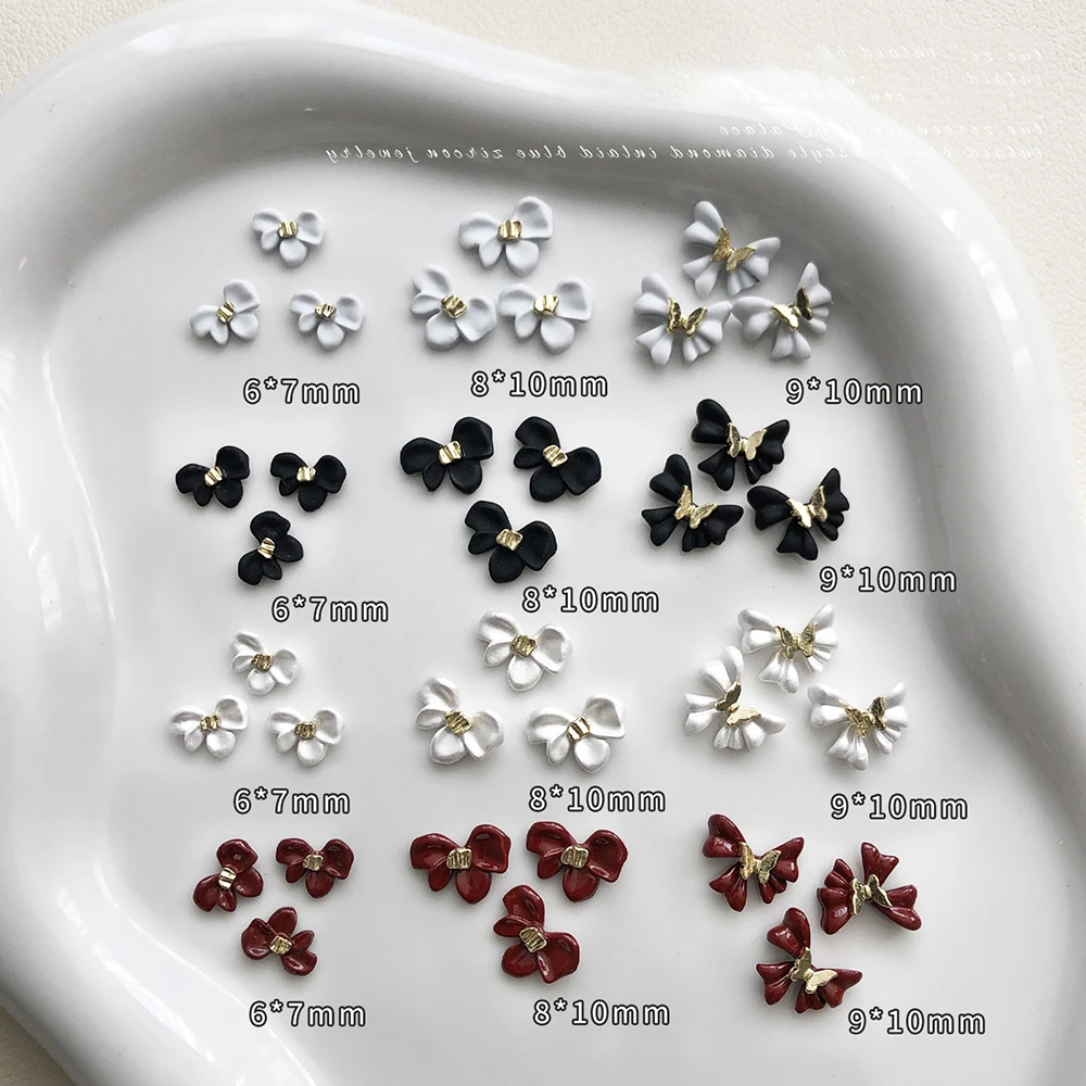 5 pezzi bianco/nero/vino rosso farfalla fiore decorazioni per unghie artistiche fiocco in lega 3D ciondoli per unghie eleganti accessori per unghie artigianali alla moda