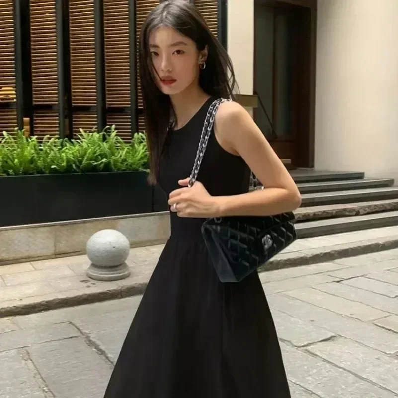 Neue Weibliche Mode Stil Kleid Sommer Rundhals ÄrmelloseHohe Taille Temperament Einfache Elegante Schwarze Lange Kleider Für Frauen