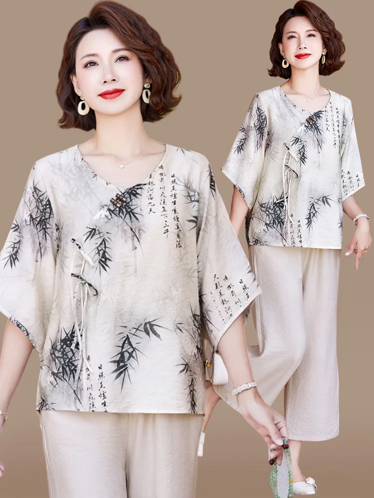 

Новый китайский летний комплект одежды для женщин среднего возраста: топ и брюки из хлопка и льна, этнический стиль, свободный крой, V-образный вырез, миди-платье.