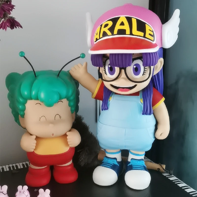 

Arale Toriyama Akira IQ Dr. Slump Classic Anime Figures Holds Cloud Lifting Toilet Doll Toy Model Ornaments Birthday Kids Gift