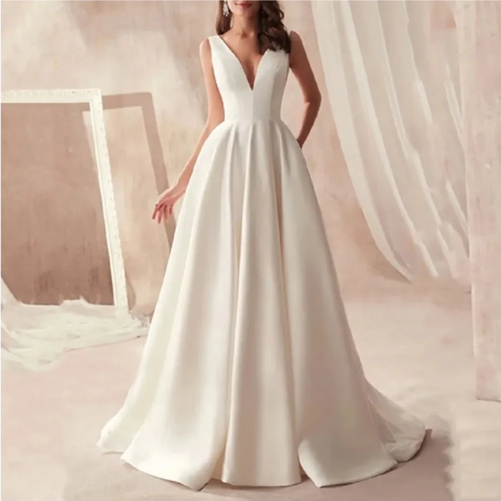 

Elegant Ivory Satin A Line Wedding Dress Deep V Neck Sexy Sleeveless Boho Garden Bridal Gown Backless Sweep Train Robe De Mariee