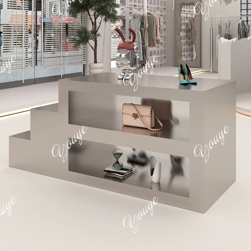 Clothing store, Nakajima Taiwan, flowing water platform, stainless steel wire drawing display stand, display stand in the middle
