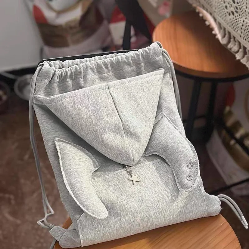 

Popular Korean Niche Women's Cute Wings Backpack Versatile Drawstring Backpack Large Capacity Creative Hoodie Hat Backpacks