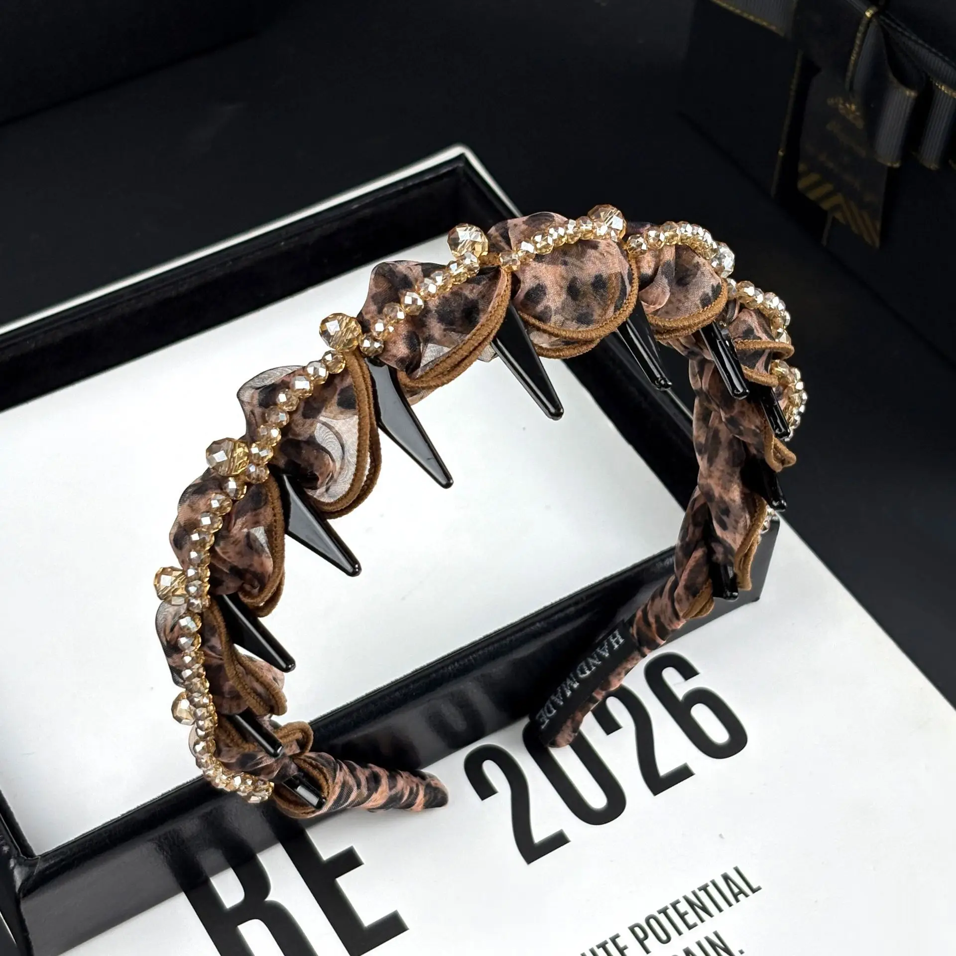 Korean version of the new crystal beaded high-end temperament versatile leopard print bow headband women's daily commuter hair a