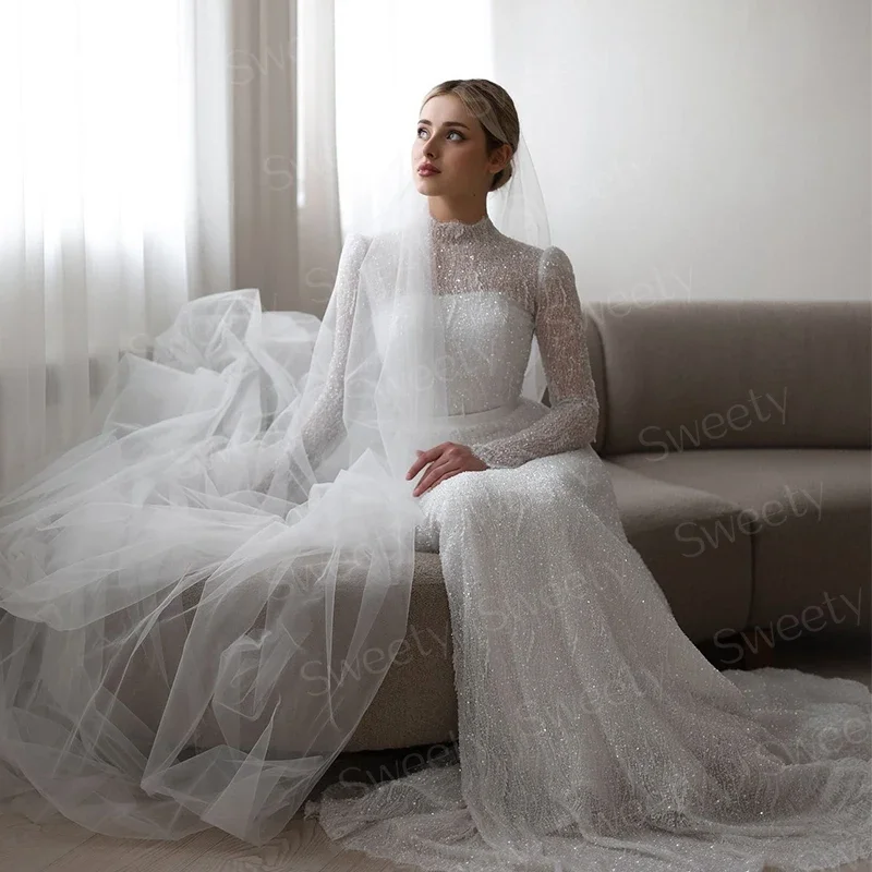 Abito da sposa a maniche lunghe con collo alto Elegante pizzo ricamato con perline Abito da ballo a trapezio con bottoni Vestido De Casamento personalizzato