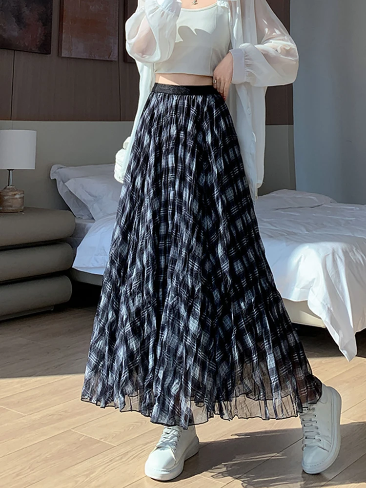 

Faion Plaid A-Line Skirt Women's Spring 2026 New Asymmetrical Loose Slimming Large Umbrella Skirt Soft Comfortable Hig...