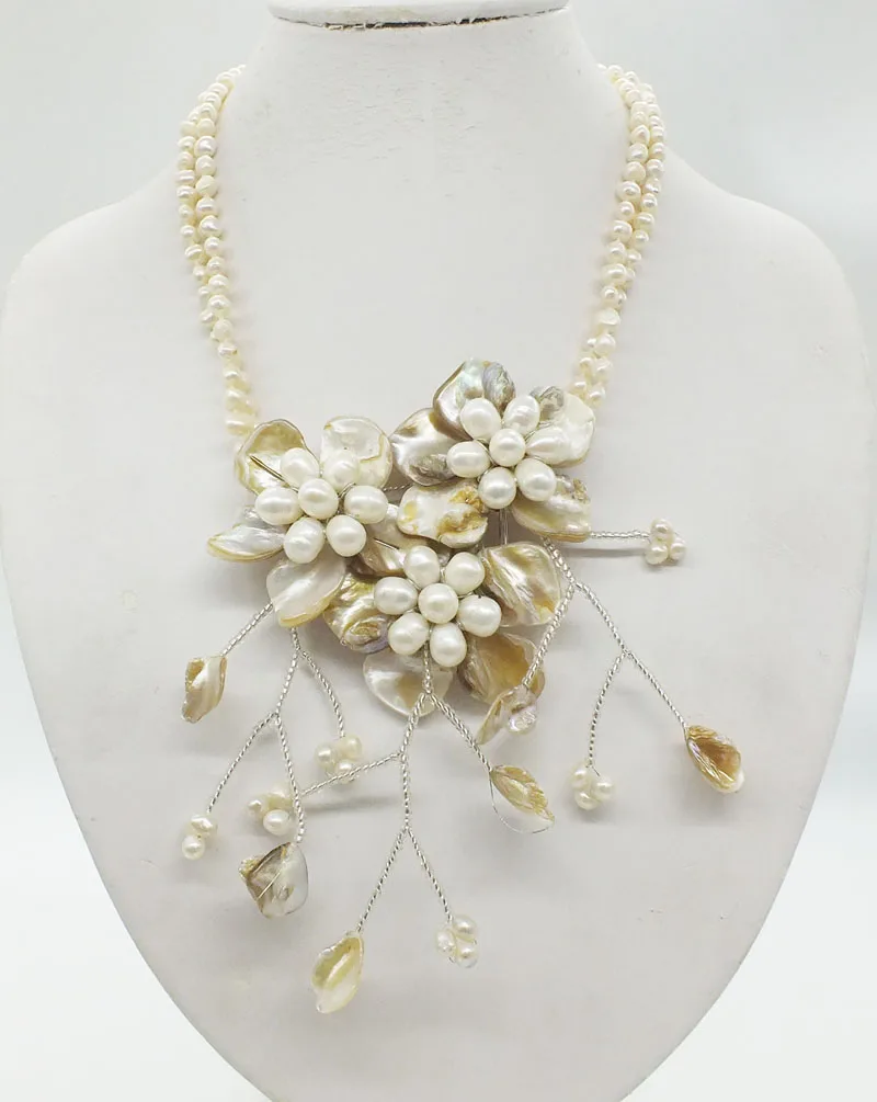 

Newest design. fashion necklace. Natural pearl. Shell. Flower necklace 19"