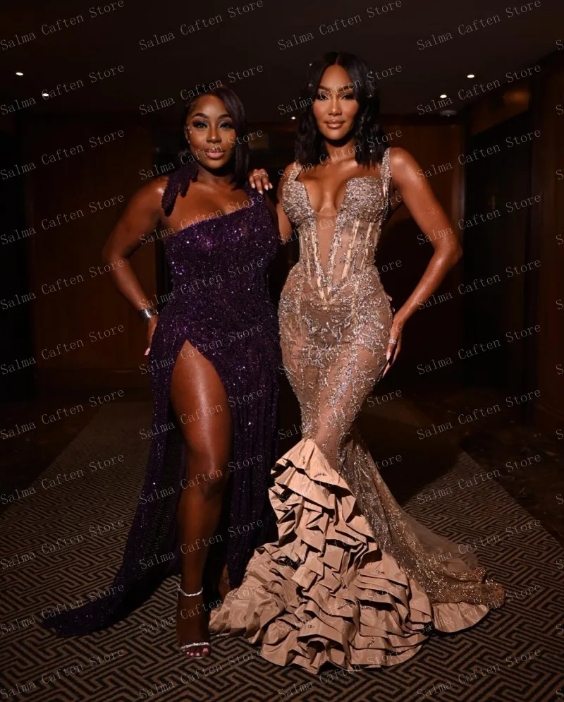 Dainty Gold Dress With Intricate Beading And Sequins Features Deep V Neckline And Mermaid Silhouette With Ruffled Train And She