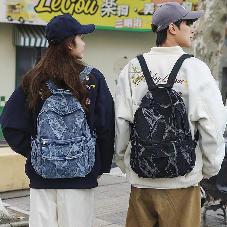 

Wear-resistant distressed denim double-shoulder bag for couples, a trendy casual travel lightweight backpack