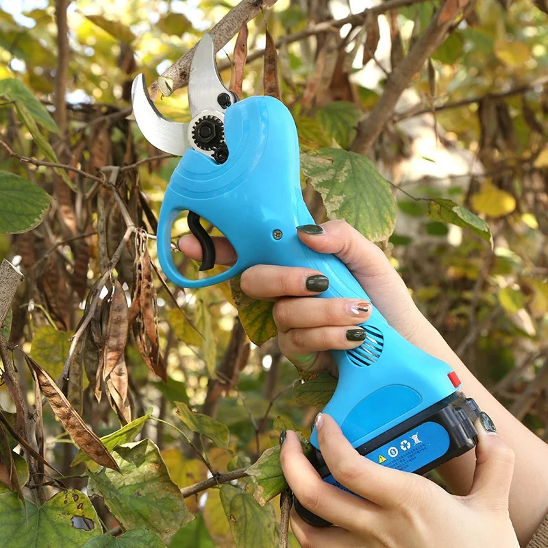 Podadora de batería inalámbrica de 50mm, tijeras eléctricas profesionales, función plegable para aplicación de árboles de jardín, suministrada de fábrica