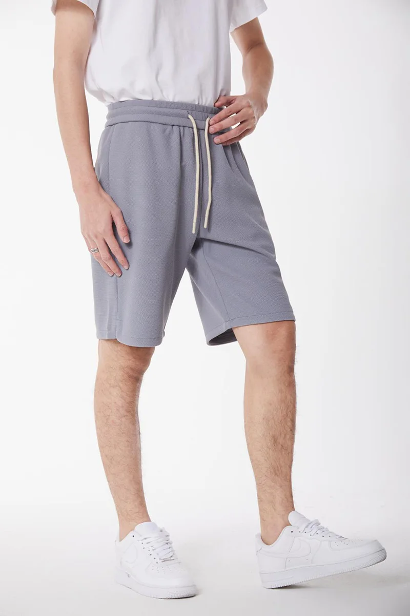 Demi-short décontracté uni pour homme, couleur unie, piqué adt, ceinture élastique, proximité, wstring, réglage, mode, court avec poches latérales