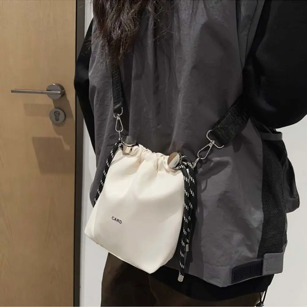 

Korean Style Black Drawstring Bucket Bag Nylon Single-shouldered INS Shoulder Bag Portable Luxury Fashion Crossbody Bags Women
