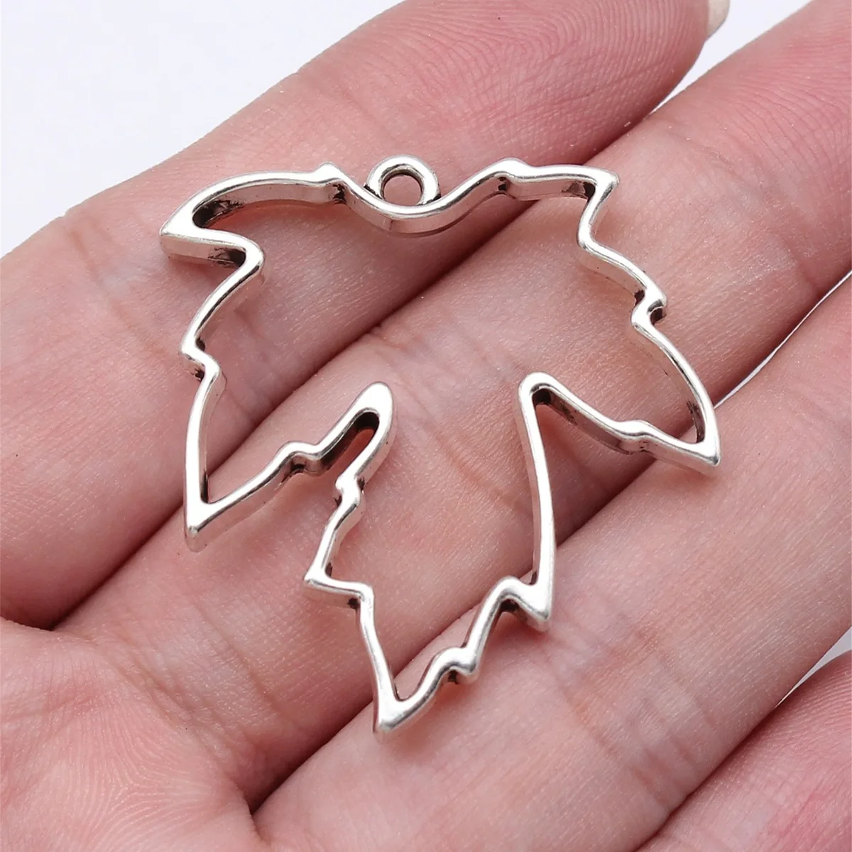 WYSIWYG 10pcs 37x35x5mm 4 Colors Hollow Geometric Glue Frame Series Leaf-Shaped Border Frame For DIY Jewelry Making