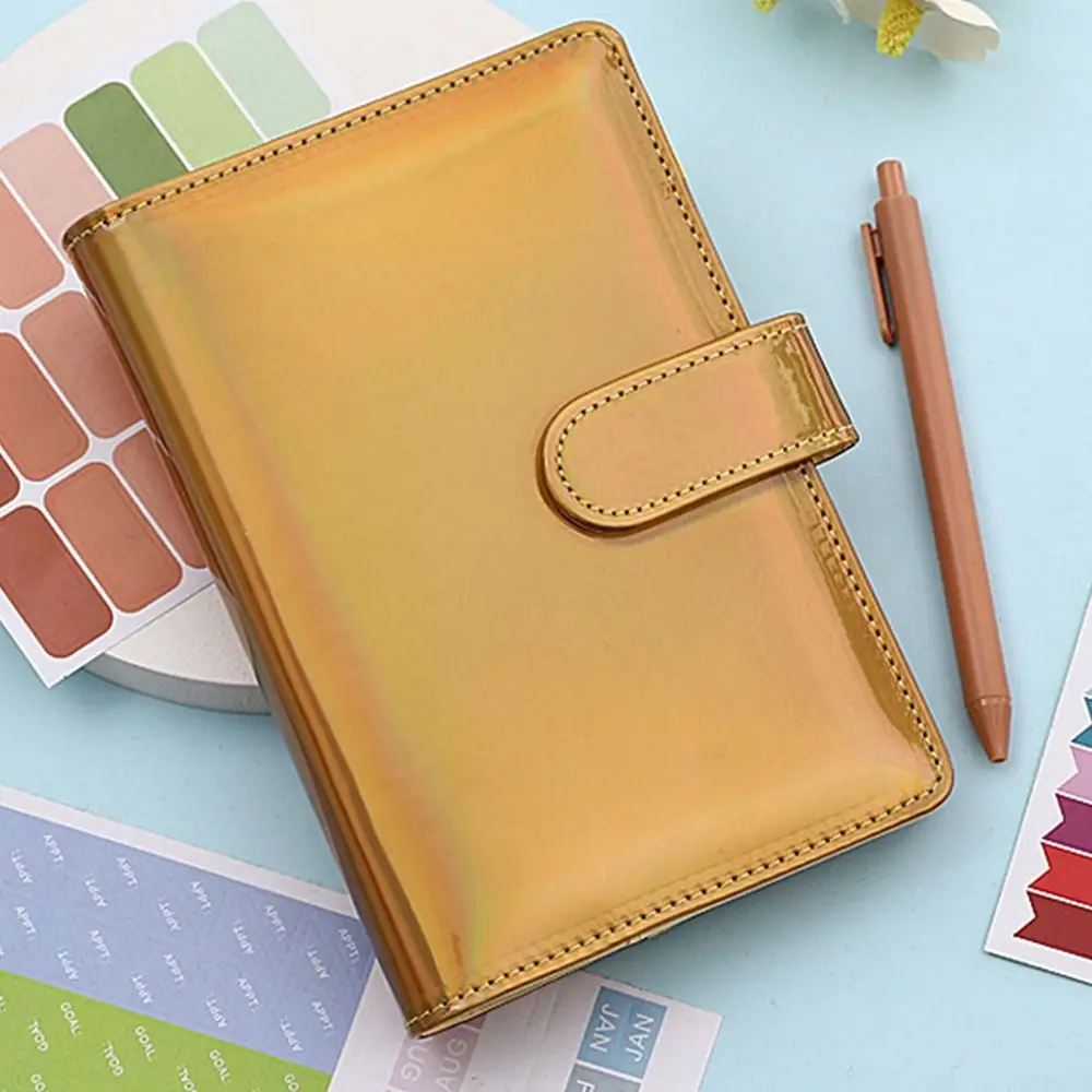 หนัง PU A6 Binder รีฟิล A6 ขนาด Magnetic Buckle Binder การออกแบบเลเซอร์ Magnetic Buckle Refillable Planner Binder