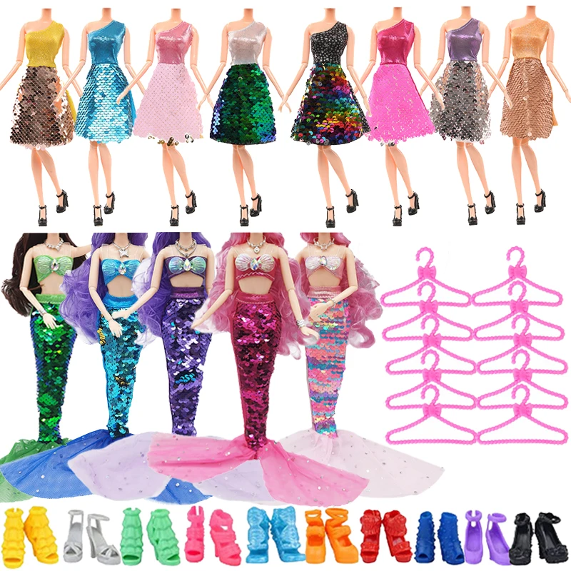 

33 items Doll Sequin Dress= 8 Sequin Dress + 5 Sequin Mermaid Skirt Princess Dress + 10 Hangers + 10 Shoes Clothing Girl Gift