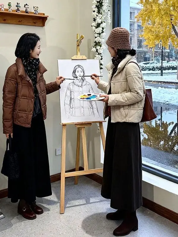 

Winter Quilted Cotton Jaet Women's ort Sle 2025 New Korean Faion Stand Collar Commute Loose Warm Cotton Coat