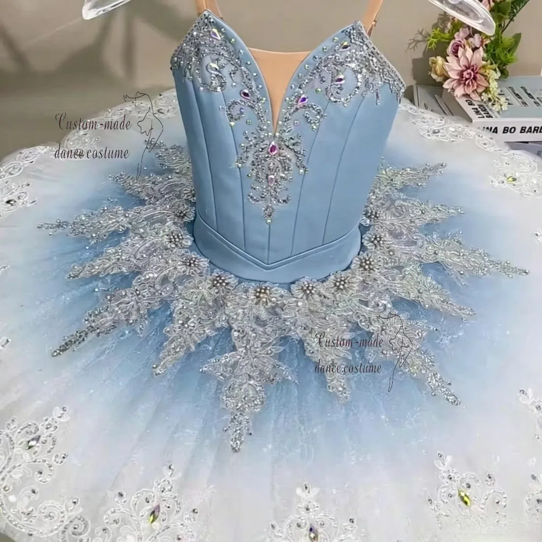 

Dreamy sky-blue fairy ballet tutu decorated with silver lace and sparkling crystals, fluffy gradient tulle, ideal for dance trai