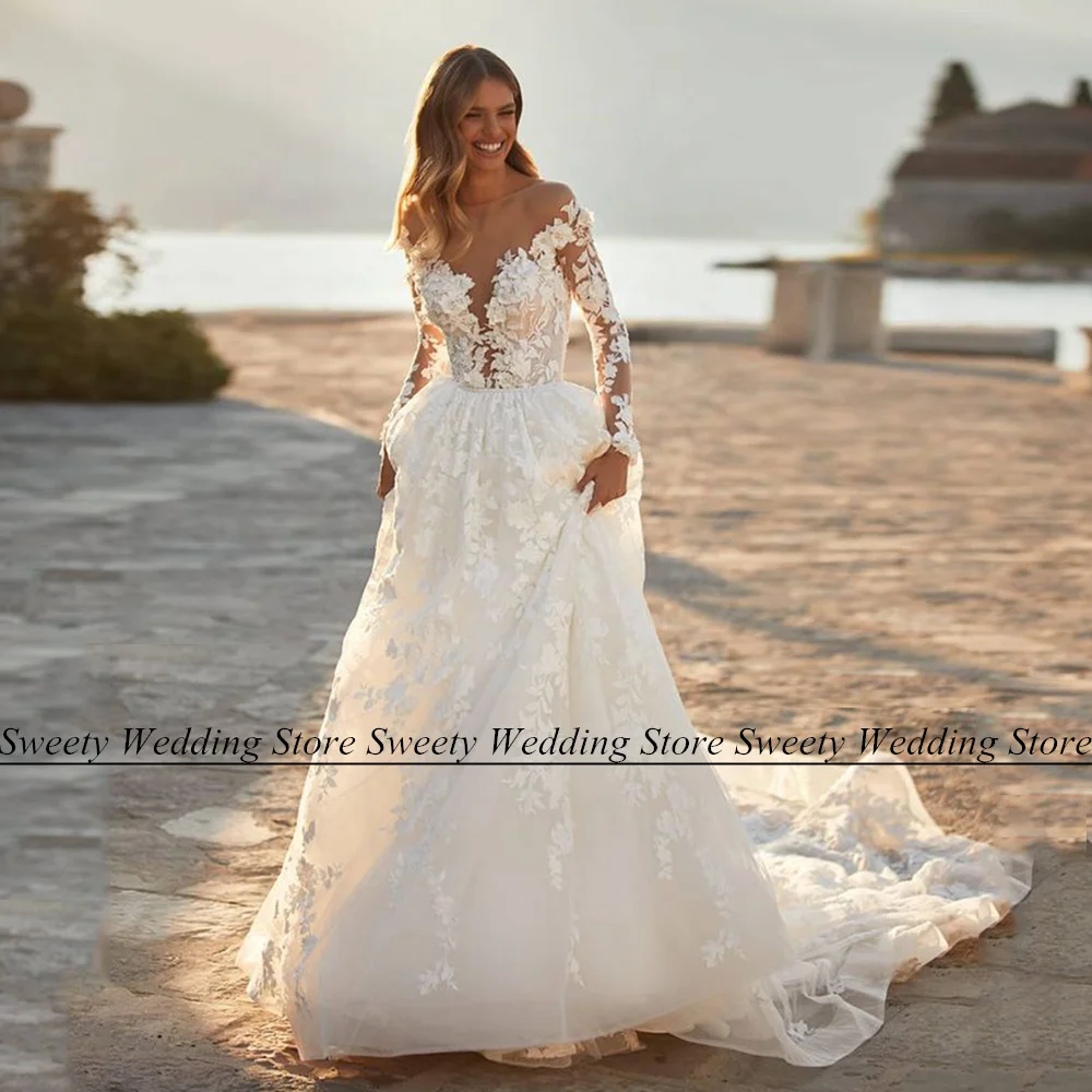 

Роскошные кружевные свадебные платья для невесты, Прозрачное платье с круглым вырезом и длинными рукавами, аппликация, ТРАПЕЦИЕВИДНОЕ свадебное платье со шлейфом, Robe Mariage