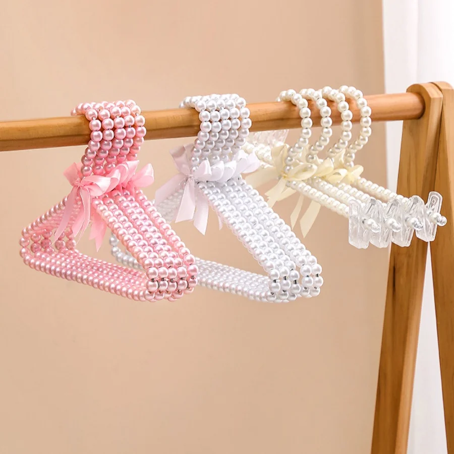 2 pearl pet clothes hangers bow hangers Pearl pants clip pet hangers hang clothes stay fairy clothes hang, create a pet wardrobe