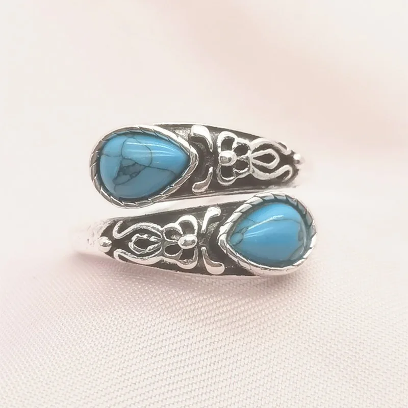 Popular moonstone spoon shaped ring with retro relief bow and Bosnian style temperament versatile and classic exquisite ring