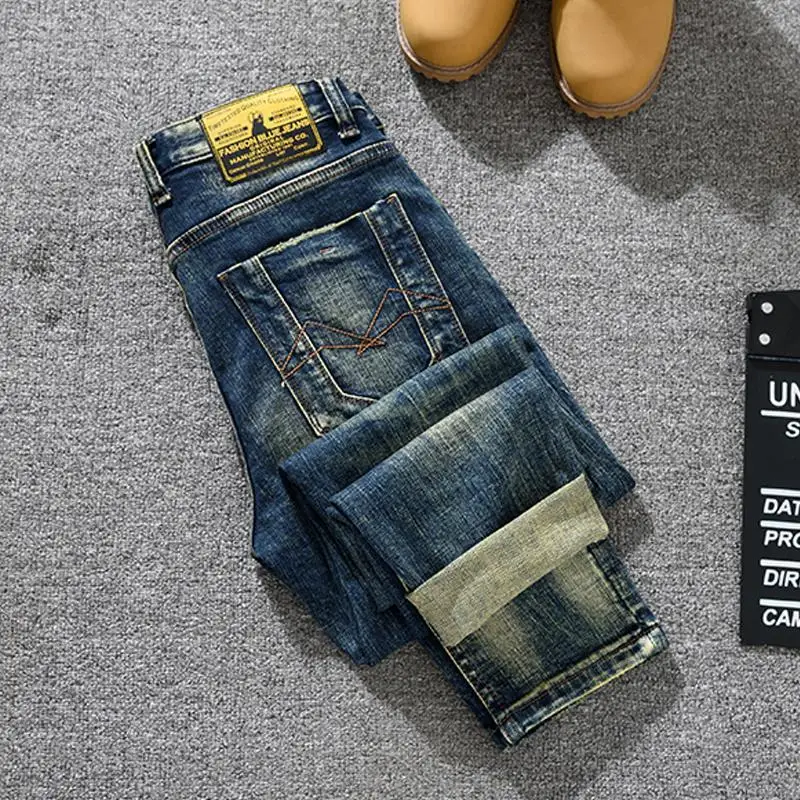 

Fashionable and nostalgic jeans for men, stretchy and slim fit with small feet, retro distressed and patched denim pants