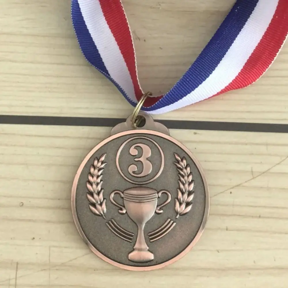 

Наградные медали из цинкового сплава: золотые, серебряные, бронзовые для победителей в танцах, плавании, спортивных играх, беговых соревнованиях. Призы и награды.