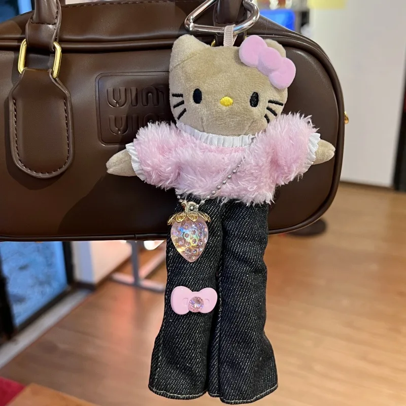 سانريو كارتون مرحبا كيتي سيقان طويلة كيتي حقيبة سحر لطيف الجينز معطف غامض سيدة نمط أفخم سلسلة مفاتيح من الكرتون هدية الكريسماس