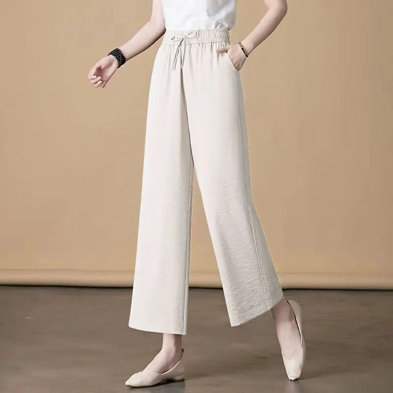 Pantalones de pierna ancha con cintura elástica para mujer, pantalones de cáñamo de algodón de cintura alta con bolsillos de retales, Color sólido, primavera y verano, nuevo