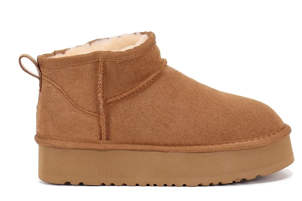 أحذية نسائية شتوية قصيرة متكاملة من الفرو بنعال سميكة للطقس البارد